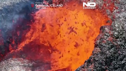 Tourists watch cooling lava as Iceland’s volcanic activity slows