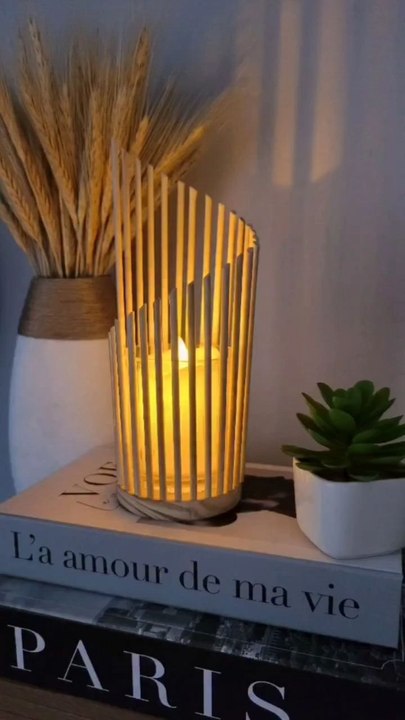 DIY BBQ Sticks Lighting Décor via: @decoracom_arteAdd a cozy glow to your outdoor gatherings with this simple DIY BBQ sticks lighting décor! Using just BBQ sticks and string lights, you can create a rustic, budget-friendly decoration.