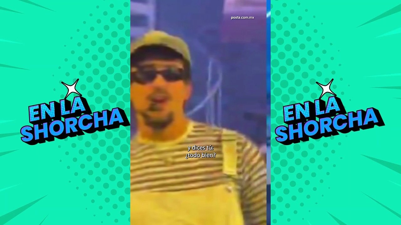 Bad Bunny le acomoda escote a una fan en pleno concierto