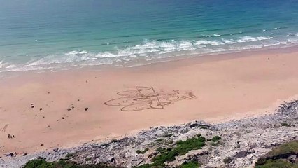 Sands transformed into a canvas for unique Eden Project art installation at Watergate Bay