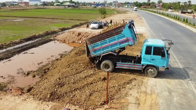Wonderful Activity Project! Land Filling Fill flooded by Skills KOMATSU dozer With​ Trucks Unloading