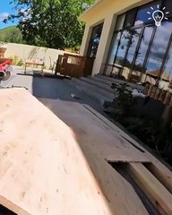 Woman crafts a rain shelter for her furry friends! 🛠️