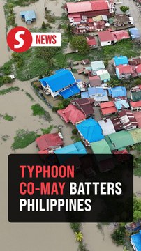 Residents evacuated from thigh-deep water as Typhoon Co-may batters Philippines