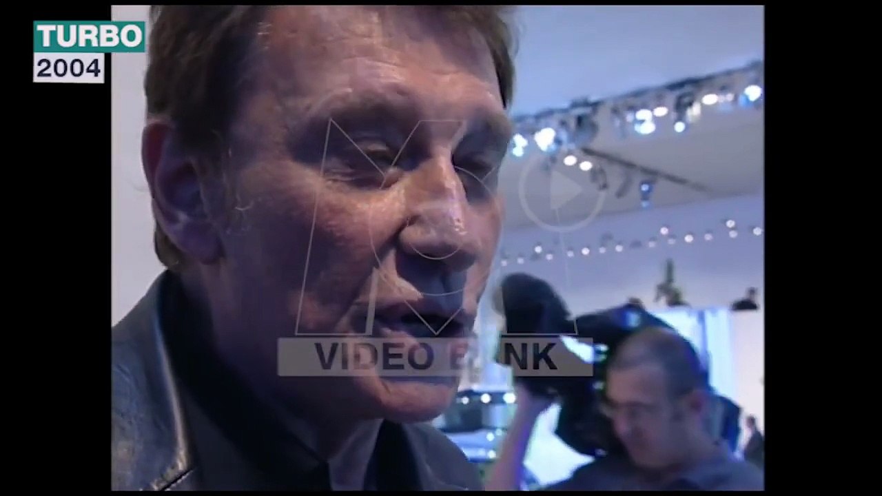 Johnny Hallyday au Salon de l’Auto – Visite exclusive (25 septembre 2004)