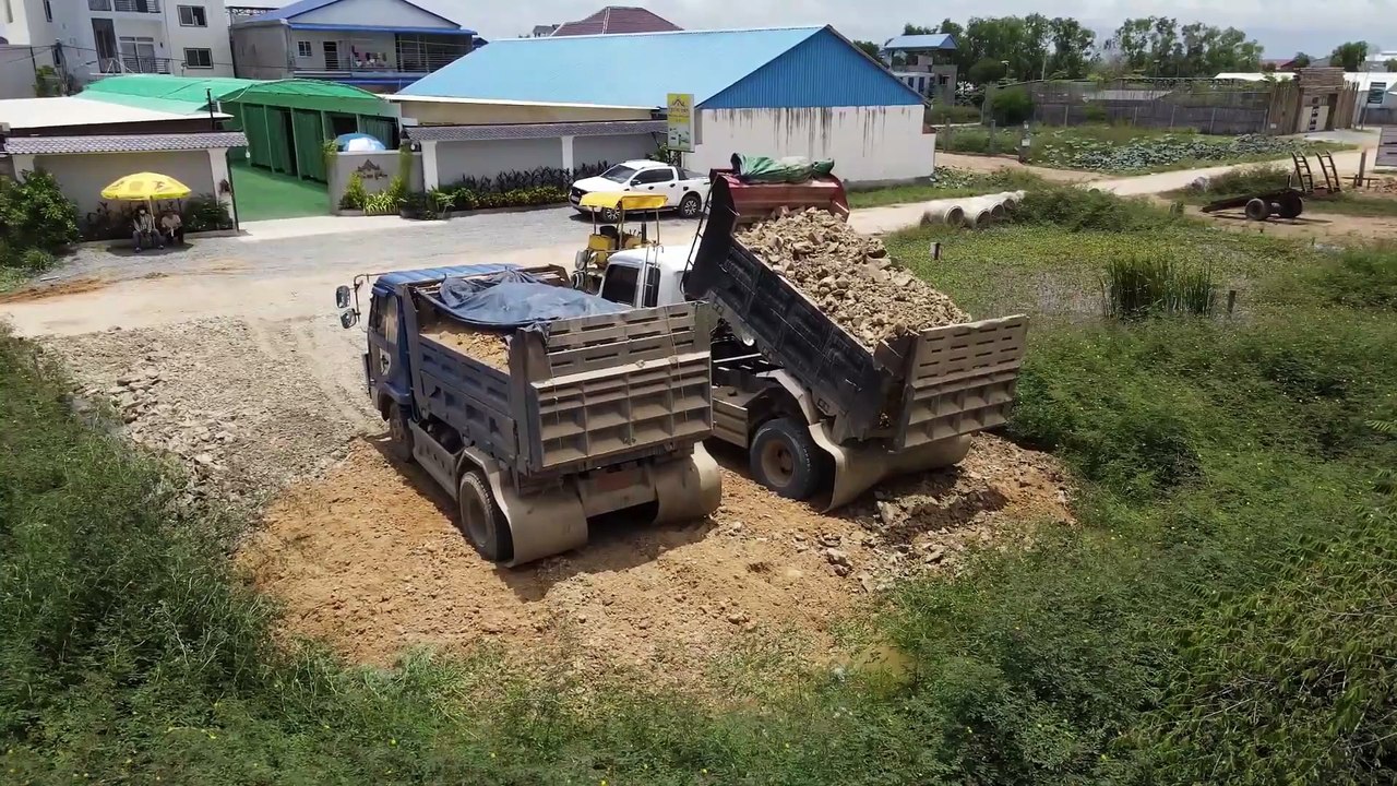 Starting New Project Landfill by Bulldozer KOMATSU D20P Pushing Stone into water with many truck 5T