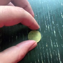 Spinning a Portuguese 10 escudo coin from 1990.