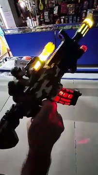 Unboxing and Review of 2 in 1 Army Toy Gun - Shoots Soft Dart Music, Projection Lights, Laser Light