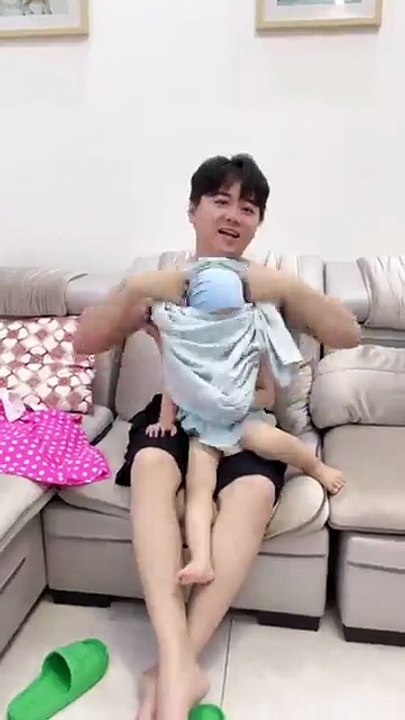 How_unreliable_Dad_is_when_it_comes_to_taking_care_of_the_kid__he_put_the_kid_in_his_own_clothes_in(360p)