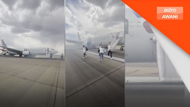 Pesawat American Airlines terbakar, penumpang cemas lari