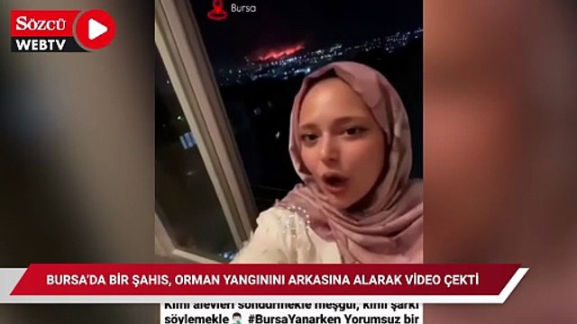 Bursa’da bir şahıs, orman yangınını arkasına alarak video çekti