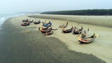 Stunning View of the Beach Filled with Boats