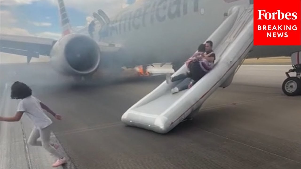 Passengers Evacuate American Airlines Plane After Landing Gear Issue Causes Fire