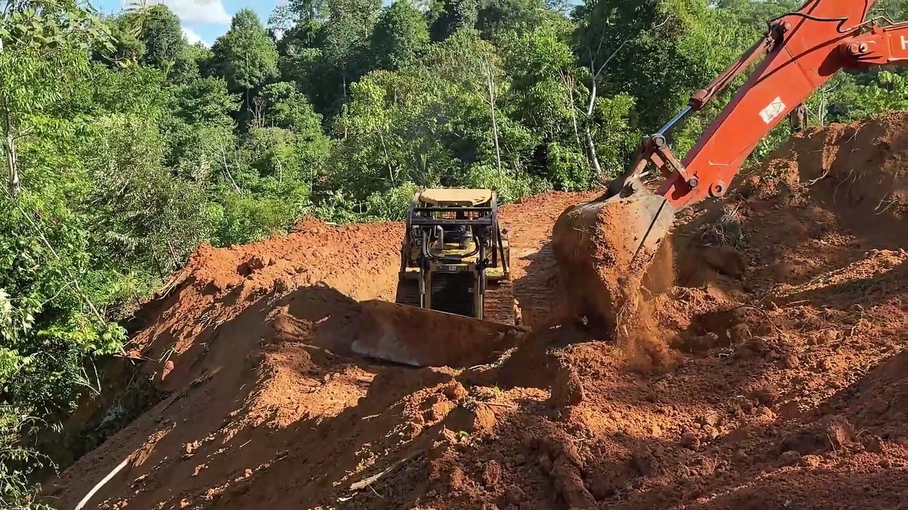Creating a Road to Overcome Steep Slopes with a Bulldozer D6R XL