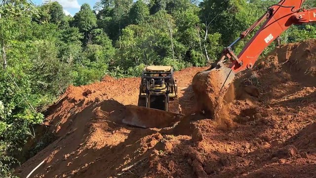 Creating a Road to Overcome Steep Slopes with a Bulldozer D6R XL