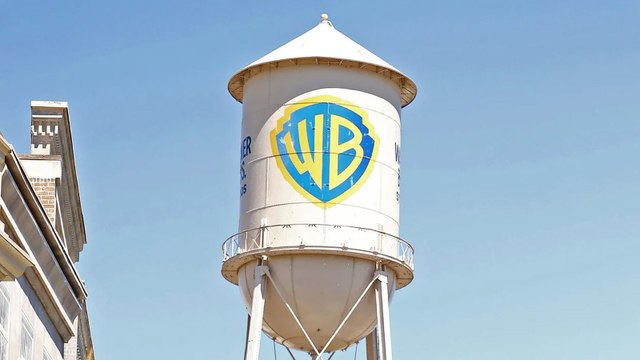 Warner Bros. Lays off 10% of Motion Picture Group | THR News Video