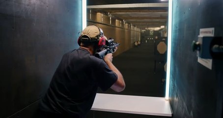 professional shooter firing at target
