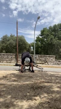 Biker Falls as His Legs Give in After Nearly 60 Miles of Riding