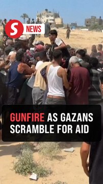 Gunfire amid chaotic scenes as Gazans scramble for aid