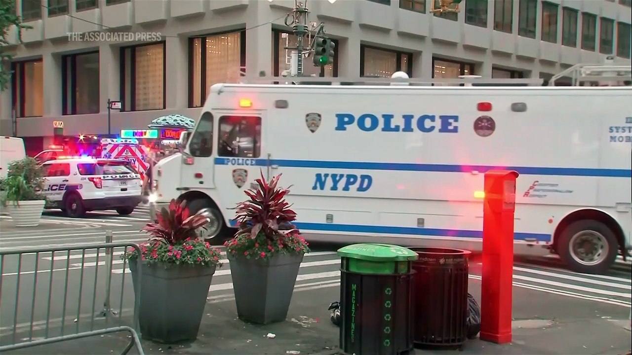 Gunman kills 4, including police officer, in shooting at New York City office tower