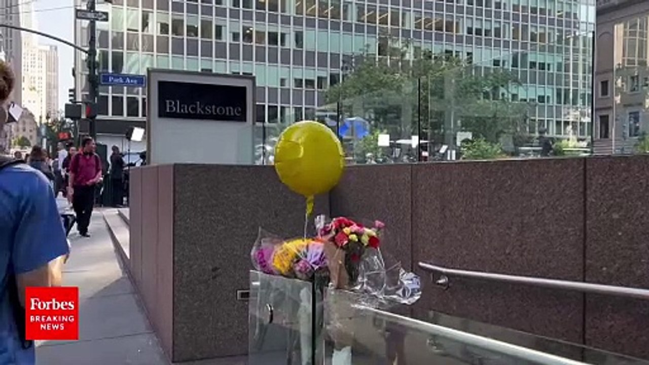 Memorial Goes Up Outside Midtown Manhattan Office Building Following Mass Shooting