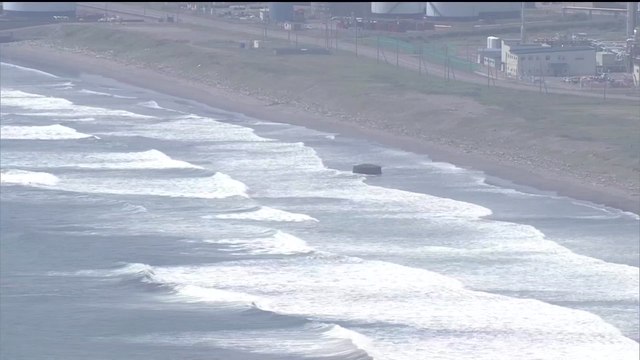 Japanese residents evacuate to higher ground as tsunami threat issued