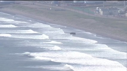 Japanese residents evacuate to higher ground as tsunami threat issued