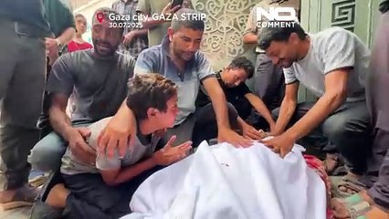 Grieving Gaza boy cries for his father killed near aid site