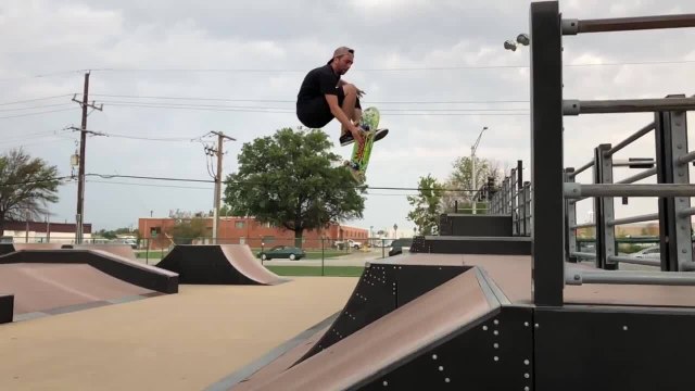 Skateboarder Peforms Multiple Tricks at Skate Park