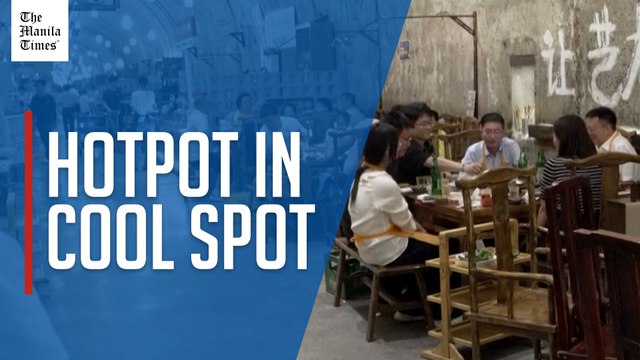Diners head underground in Chongqing to escape scorching heat