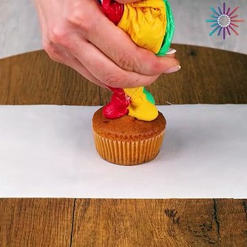 Turning plain cupcakes into colorful little masterpieces! 🧁🌈