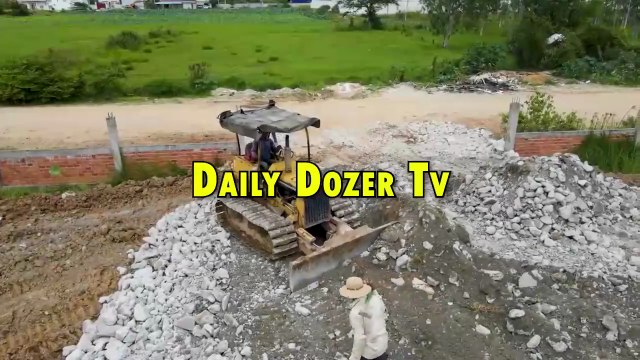 Dump truck starting Unloading Stone and Soil into water open New Project with Bulldozer Komatsu D31P