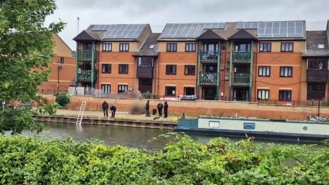 Northants Police continue river searches as part of ongoing murder investigation after a man was found fatally wounded by the River Nene