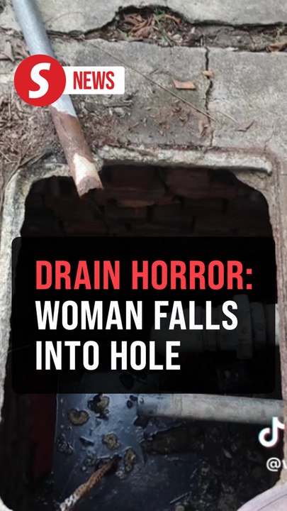 Vanishing act: Woman falls into uncovered sewage drain hole