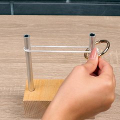 The ultimate ring and rope puzzle solution