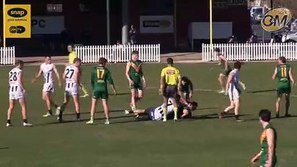 Ben Rigoni kick's North's first goal of the second quarter