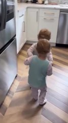 Toddler Dances Joyfully With Twin Sibling