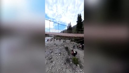 Five dead after suspension bridge collapses at tourist spot