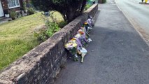 Floral tributes laid at crash scene