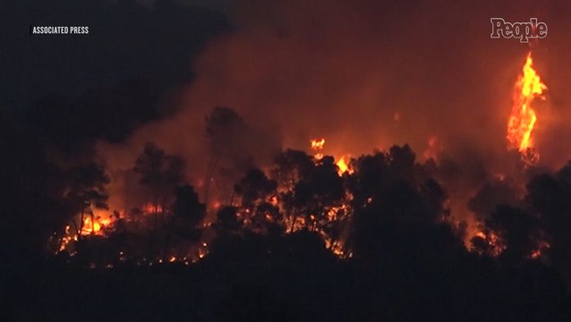 1 Dead, Thousands Evacuated as Firefighters Battle Raging Wildfire: 'A Catastrophe of Unprecedented Scale'