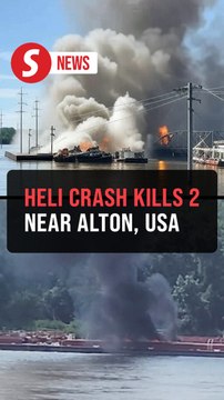 Helicopter crash kills two people, shuts Mississippi River, Coast Guard says