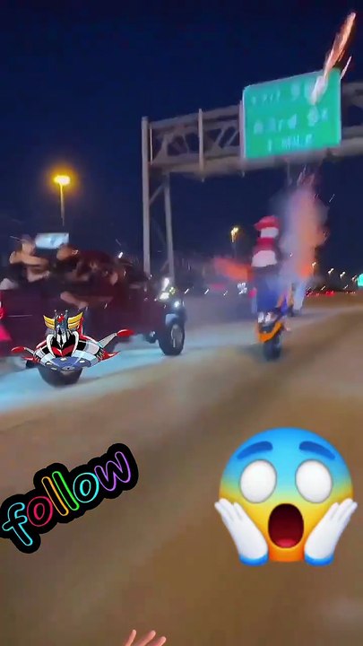Scooter riding on two wheels with fireworks!