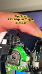 Adaptive trigger for a PlayStation 5 controller in action.