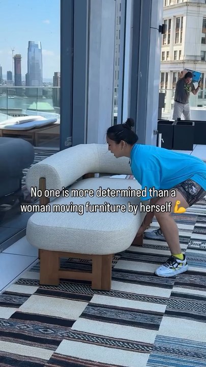 No One Is More Determined To Get the Job Done Than a Woman Moving Furniture