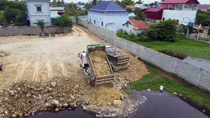 Dump Truck 5T Starting unloading  Soil Stone and Bulldozer Pushing it into water Filling Long Lake