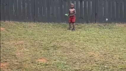 Little boy cries after his parents retaliate with water balloons