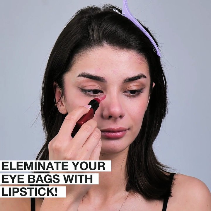 Hide your under-eye bags with red lipstick!💄