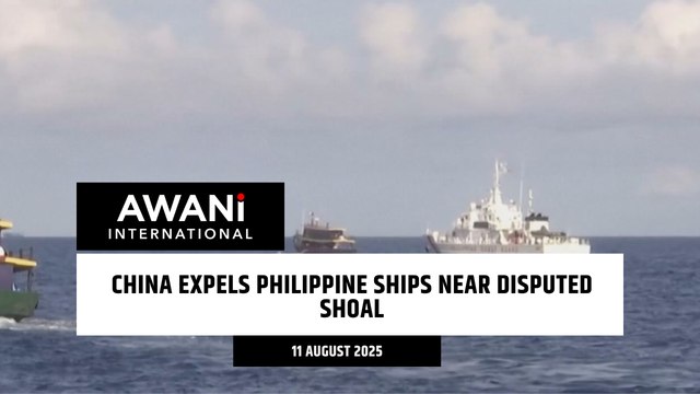 China expels Philippine ships near disputed shoal