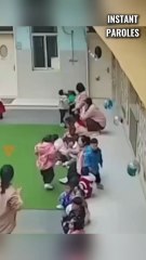 This kindergarten student brings a chair to this pregnant teacher