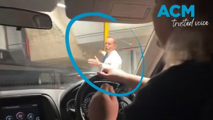 Former PM Tony Abbott spotted directing traffic in Sydney car park