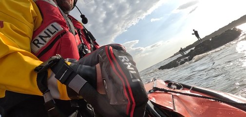 RNLI rescue teenagers from rising Welsh coast tide